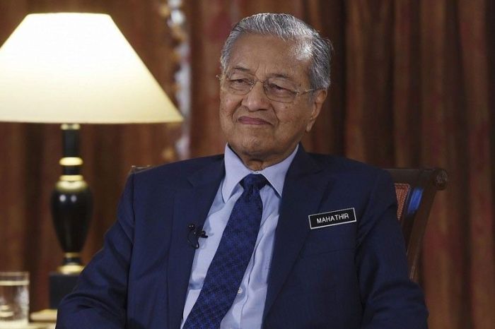 Malaysia's Prime Minister Mahathir Mohamad delivers his speech at the ... Mahathir mohamad malaysia prime minister hundred years trump world interview