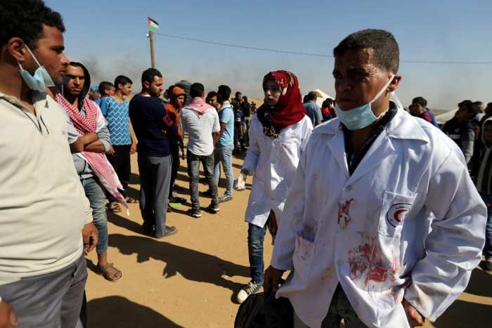 Palestinian medics in Gaza struggle to save lives under Israeli siege ... Least 24 palestinians killed near gaza aid site medics say