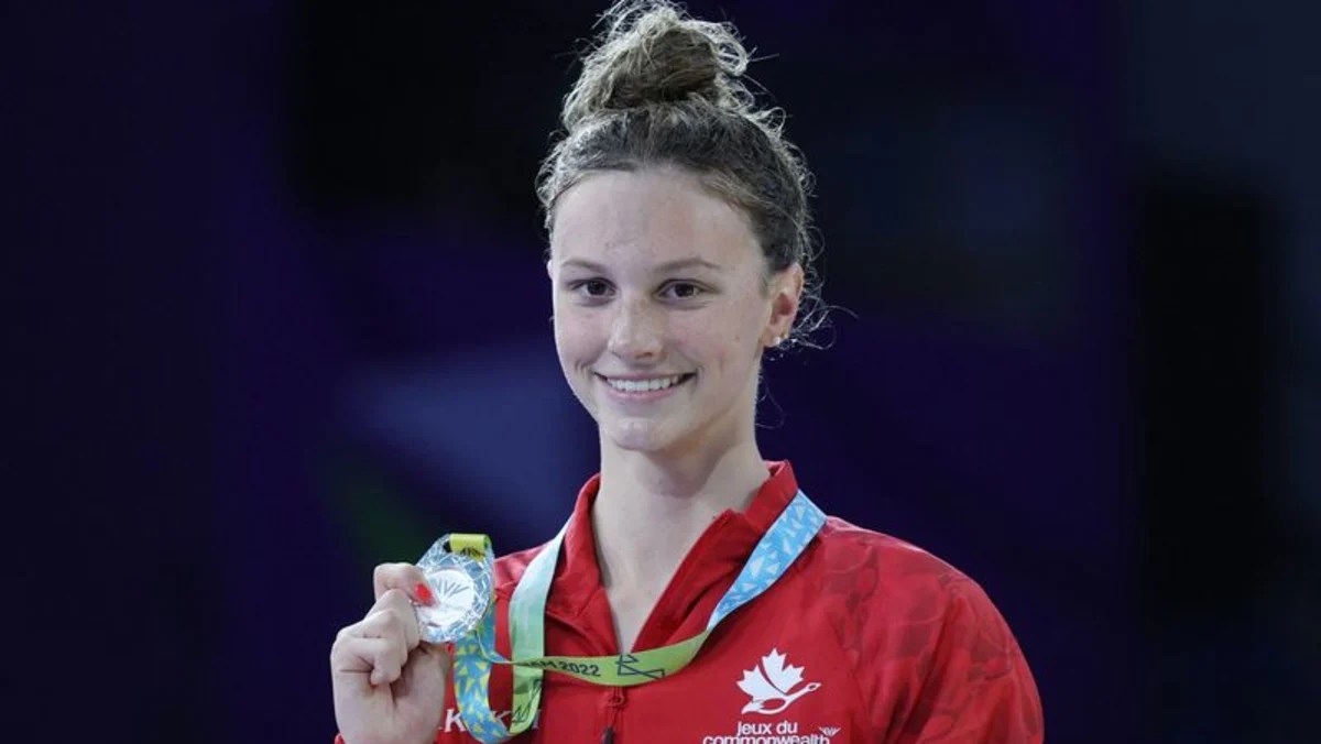 Canadian teenager McIntosh sets another world record - CNA Mcintosh breaks hosszus im world record canadian trials