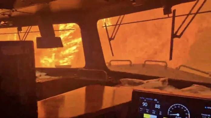 cn-rail-faces-scrutiny-after-crew-narrowly-escapes-northern-ontario-wildfire-as-operations-suspend-amid-regional-crisis